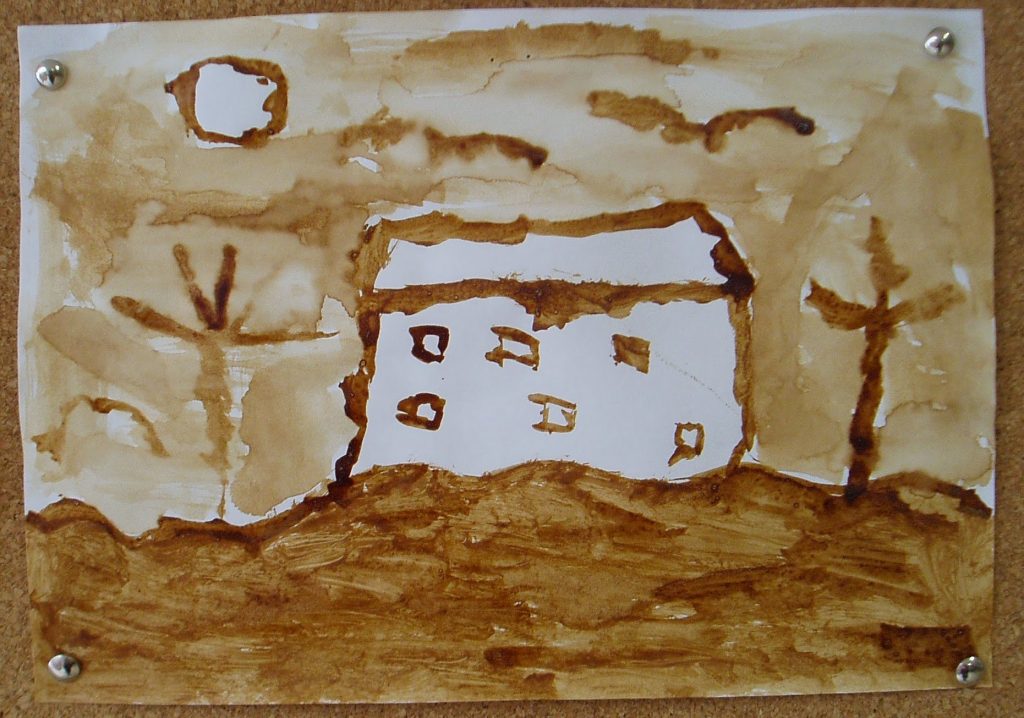 Casa encantada pintada con el café para Halloween.
